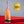 Bottle of Lyre's Classico Rosé on a red and gray background next to a gold Spirits Business Global Low & No Masters 2026 award medallion.