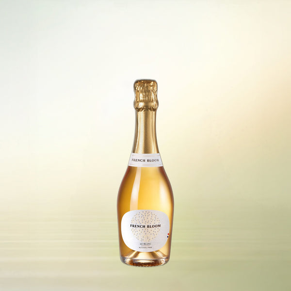 French Bloom Le Blanc non-alcoholic sparkling wine, 375 ml half bottle on cream background