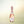 French Bloom Le Rosé non-alcoholic sparkling wine, 375 ml half bottle on cream background
