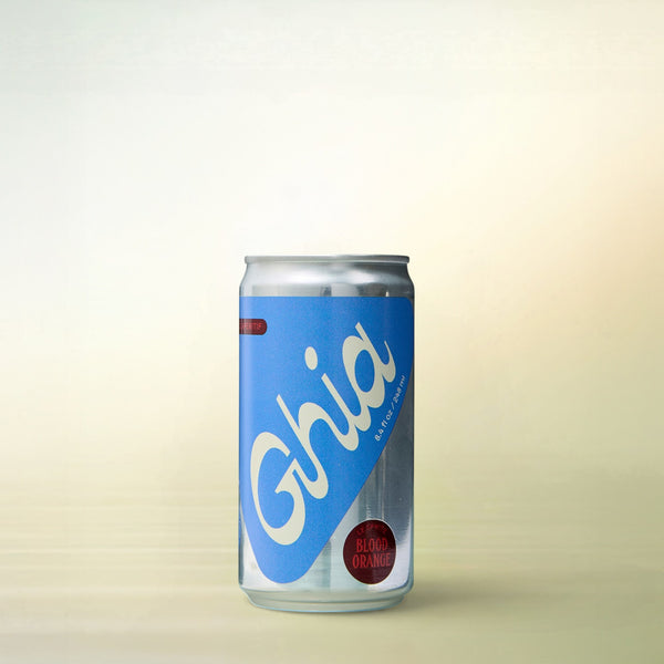 Ghia Le Spritz Blood Orange (8.4 oz can), alcohol-free functional beverage, can on a soft gradient background