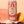 Corpse Reviver Guava Rose alcohol-free functional beverage can with a pink drink, lemon half, and rose petals