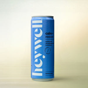 Heywell calm + restore sparkling blackberry ginger, alcohol-free functional wellness beverage, can on gradient background