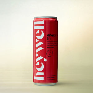 Heywell energy + lift sparkling cherry limeade, alcohol-free functional wellness beverage, can on a soft gradient background