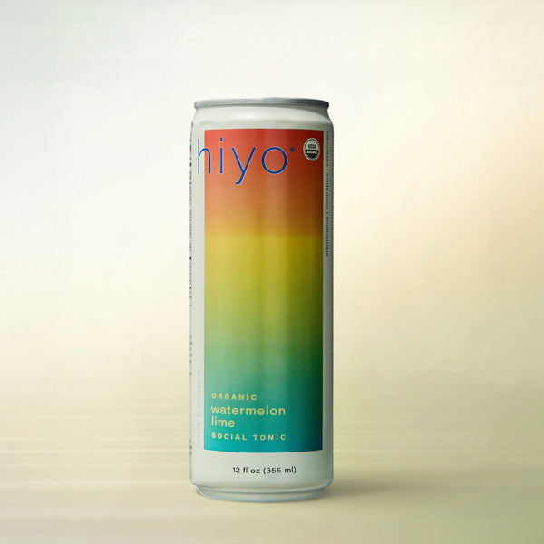hiyo Watermelon Lime Seltzer, alcohol-free functional wellness beverage, can on a soft gradient background