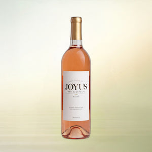 Jøyus Rosé non-alcoholic still wine bottle on cream background