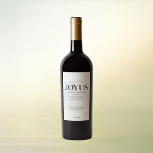 Joyus Cabernet Sauvignon non-alcoholic wine, 750 ml bottle on cream background