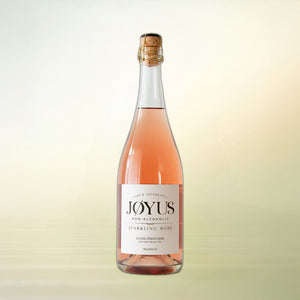Joyus Sparkling Rosé non-alcoholic wine, 750 ml bottle on cream background