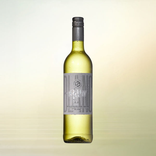 Noughty Blanc non-alcoholic wine bottle on cream background