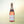 Noughty Rosé non-alcoholic wine bottle on cream background