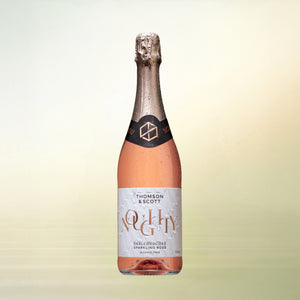 Noughty Rosé non-alcoholic wine bottle on cream background