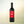 Noughty Rouge non-alcoholic wine bottle on cream background