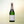 Noughty Sparkling Chardonnay non-alcoholic wine bottle on cream background