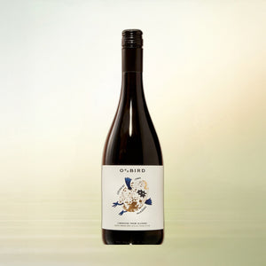 OddBird GSM non-alcoholic red wine, 750 ml bottle on cream background