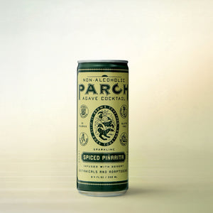 Parch Spirits Co. PARCH Spiced Piñarita Agave Cocktail, alcohol-free, can on a soft gradient background