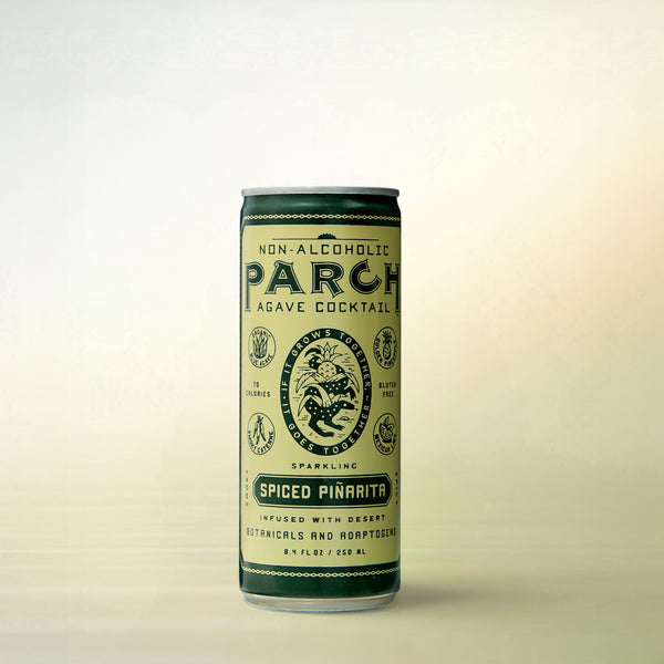 Parch Spirits Co. PARCH Spiced Piñarita Agave Cocktail, alcohol-free, can on a soft gradient background