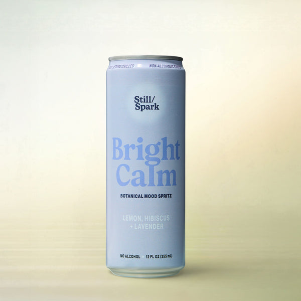 Still/Spark Bright Calm (Lemon, Hibiscus + Lavender), alcohol-free functional wellness beverage, can on gradient background