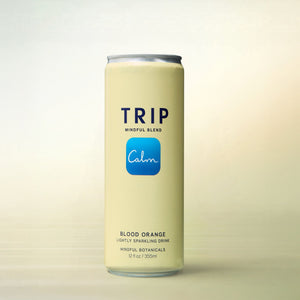 Trip Mindful Blend Blood Orange, alcohol-free functional wellness beverage, can on a soft gradient background
