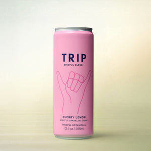 Trip Mindful Blend Cherry Lemon, alcohol-free functional wellness beverage, can on a soft gradient background