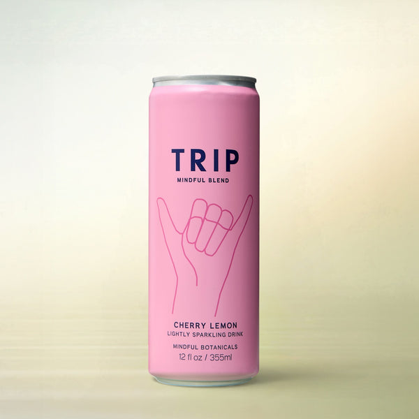 Trip Mindful Blend Cherry Lemon, alcohol-free functional wellness beverage, can on a soft gradient background