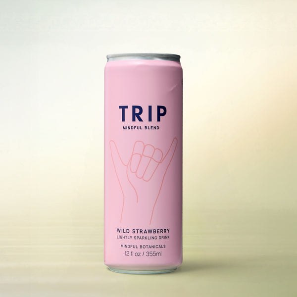 Trip Wild Strawberry Sparkling Botanical Drink, alcohol-free functional wellness beverage, can on a soft gradient background