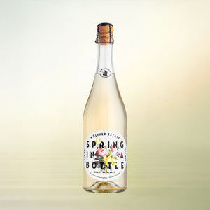 Wölffer Estate Spring in a Bottle Blanc de Blanc non-alcoholic wine bottle on cream background